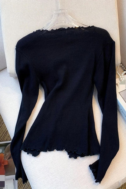 Pullover mit Strass-Schleife und gewelltem Saum